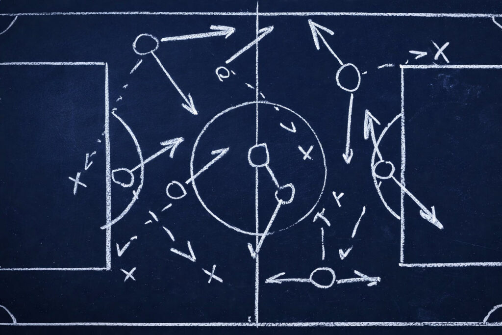 Soccer Strategy on Blue Chalkboard
