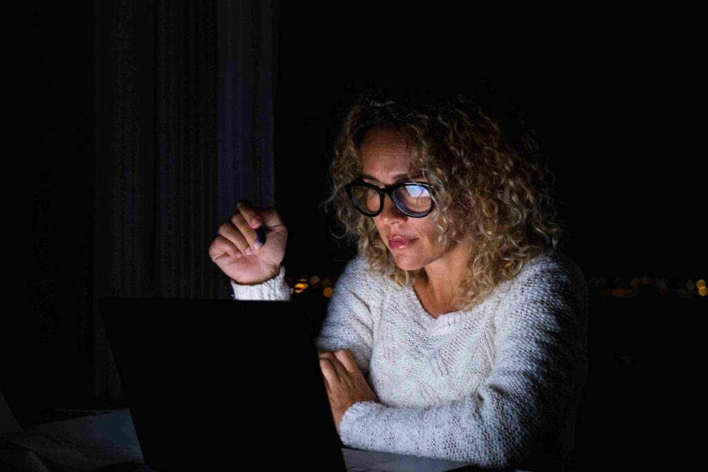 Woman Searching online at night